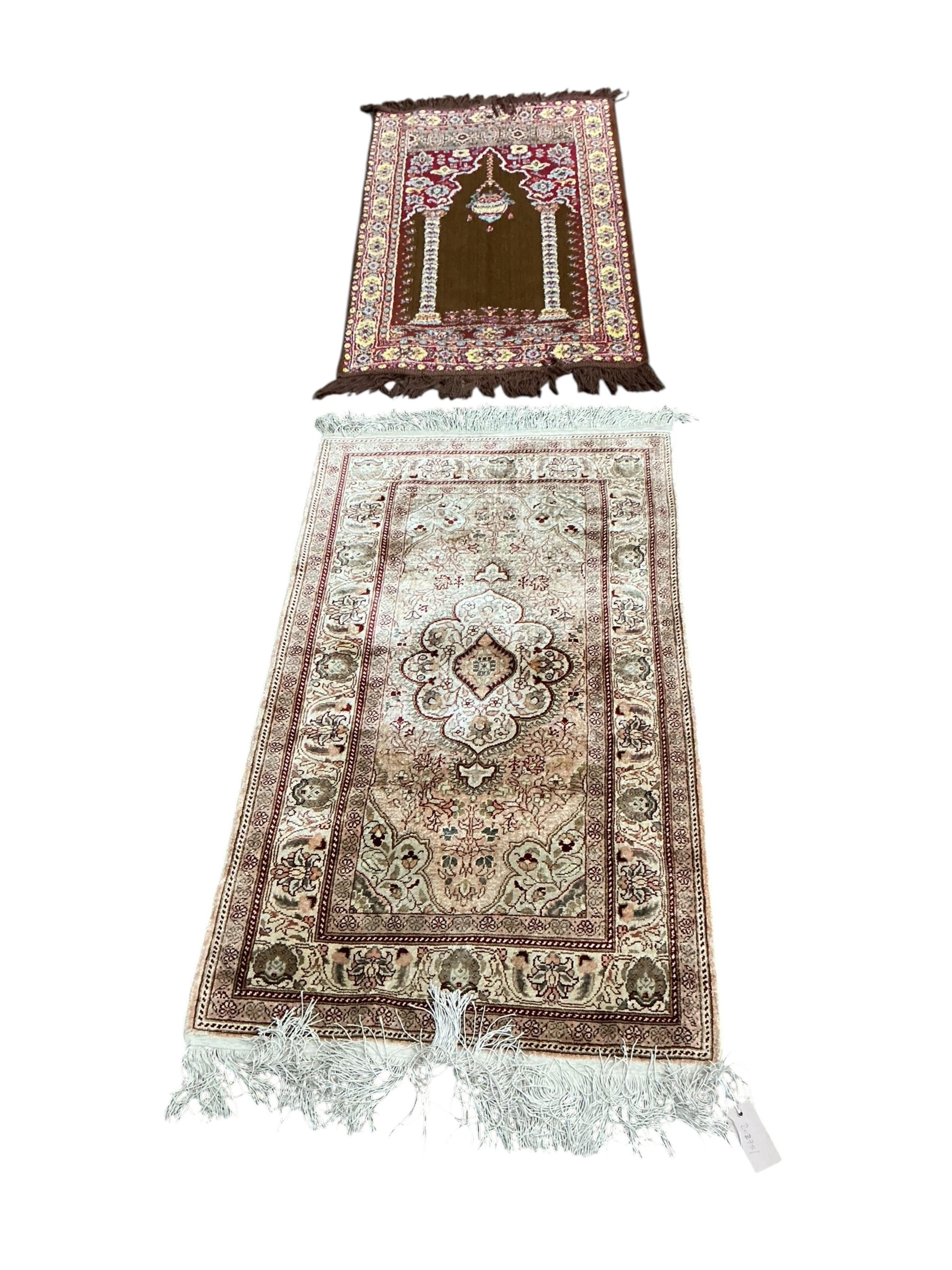 Two North West Persian prayer mats, larger 108 x 64cm